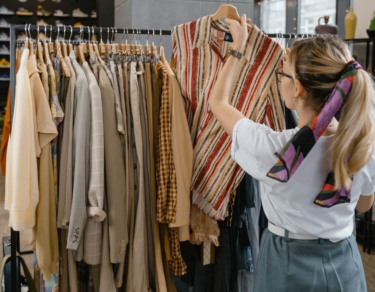 Woman shopping for clothes Image