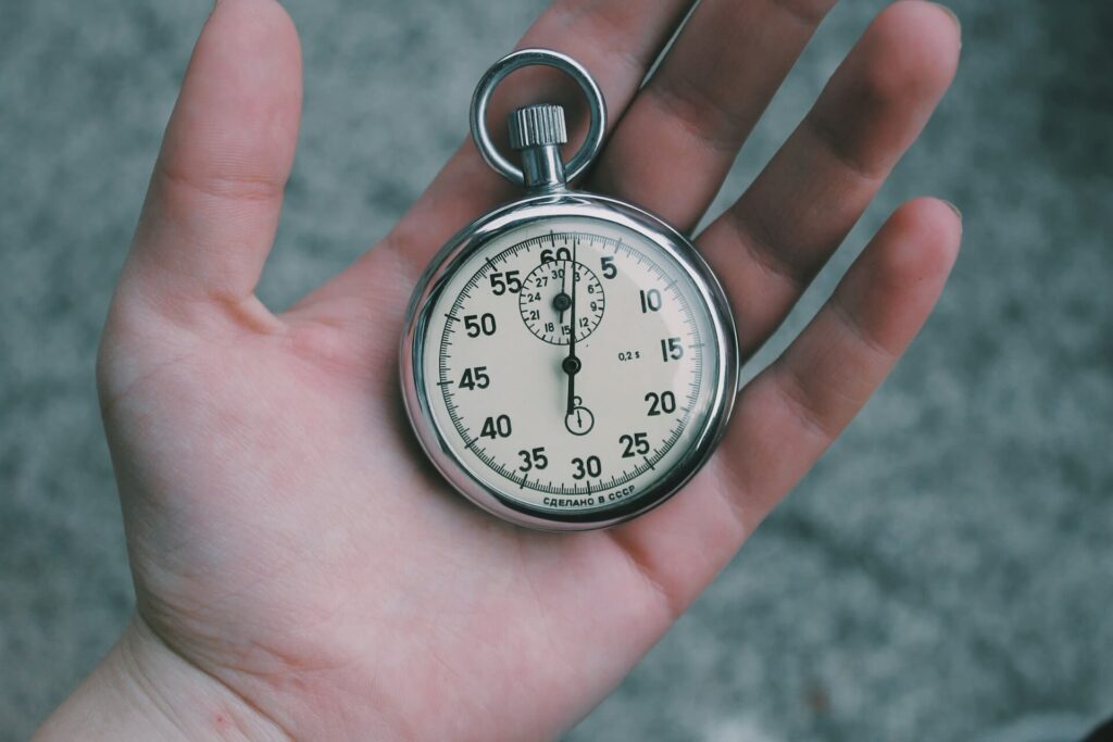 Stopwatch Time in Hand Image